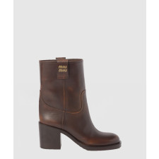 미우미우 퓌메 가죽 부티 5U966D