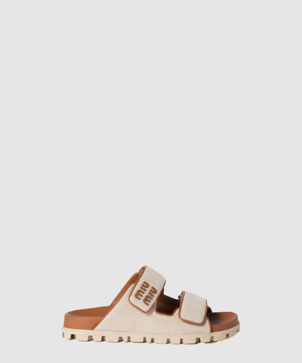 미우미우 캔버스 슬라이드 뮬 5XX658